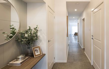 Hallway from the front door to the open plan living, kitching and dining area of the Avalon 220 display home