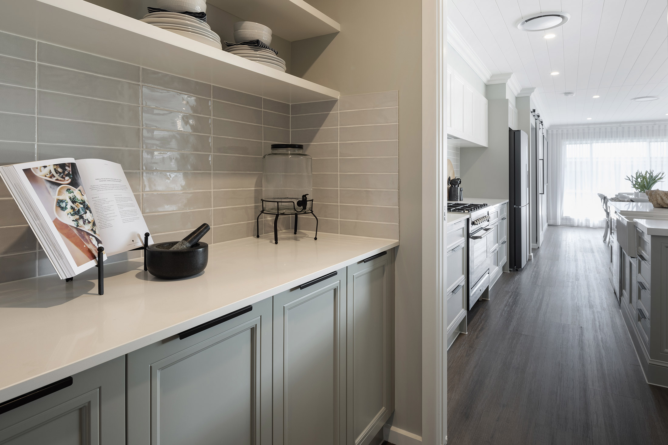 A portion of the scullery opening up to the kitchen in the Avoca display home