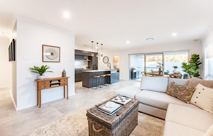 View from the living area of the open plan living, dining and kitchen in the Ohana 240 display home