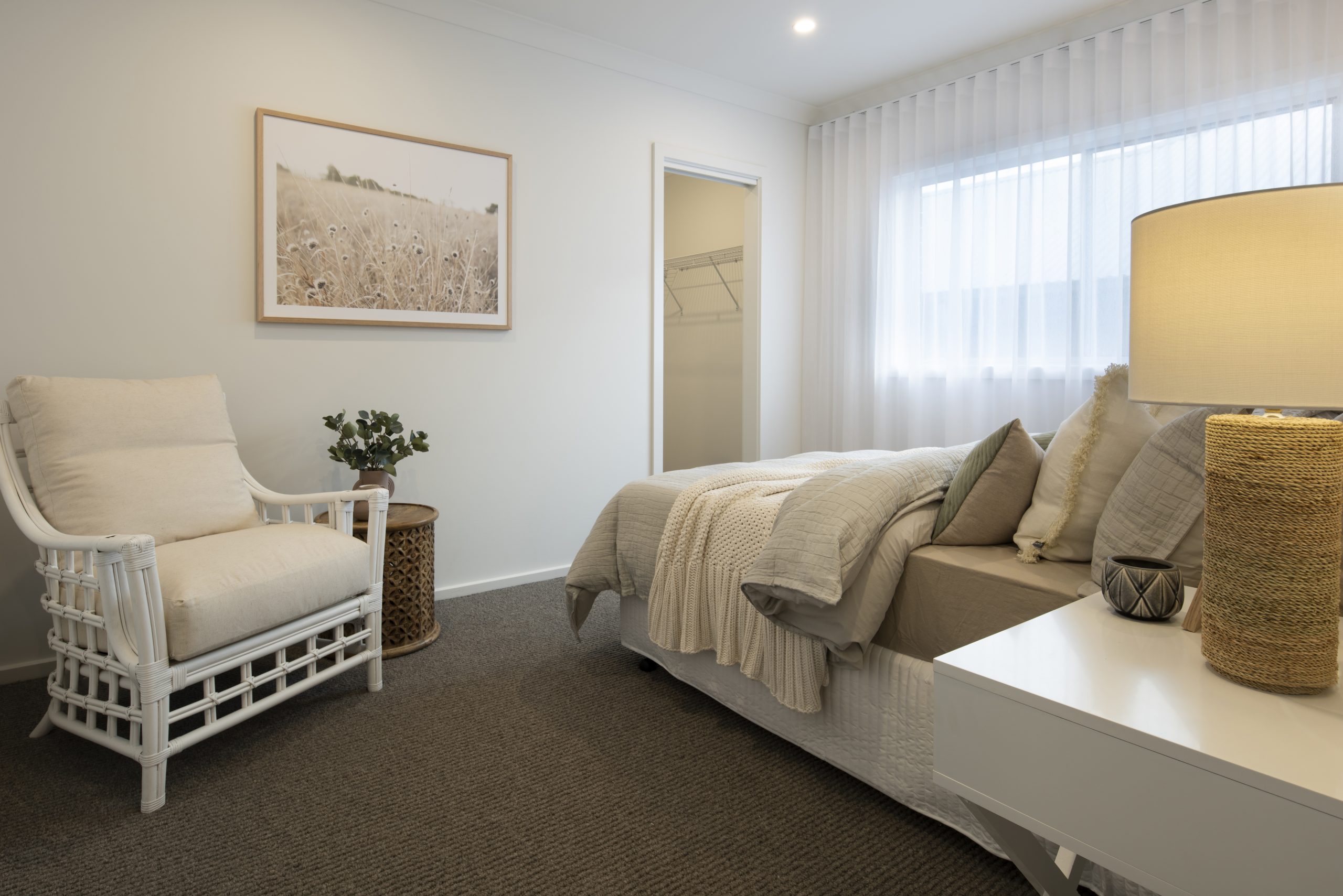 A minor bedroom in the Avalon 220 display home with single walk in wardrobe