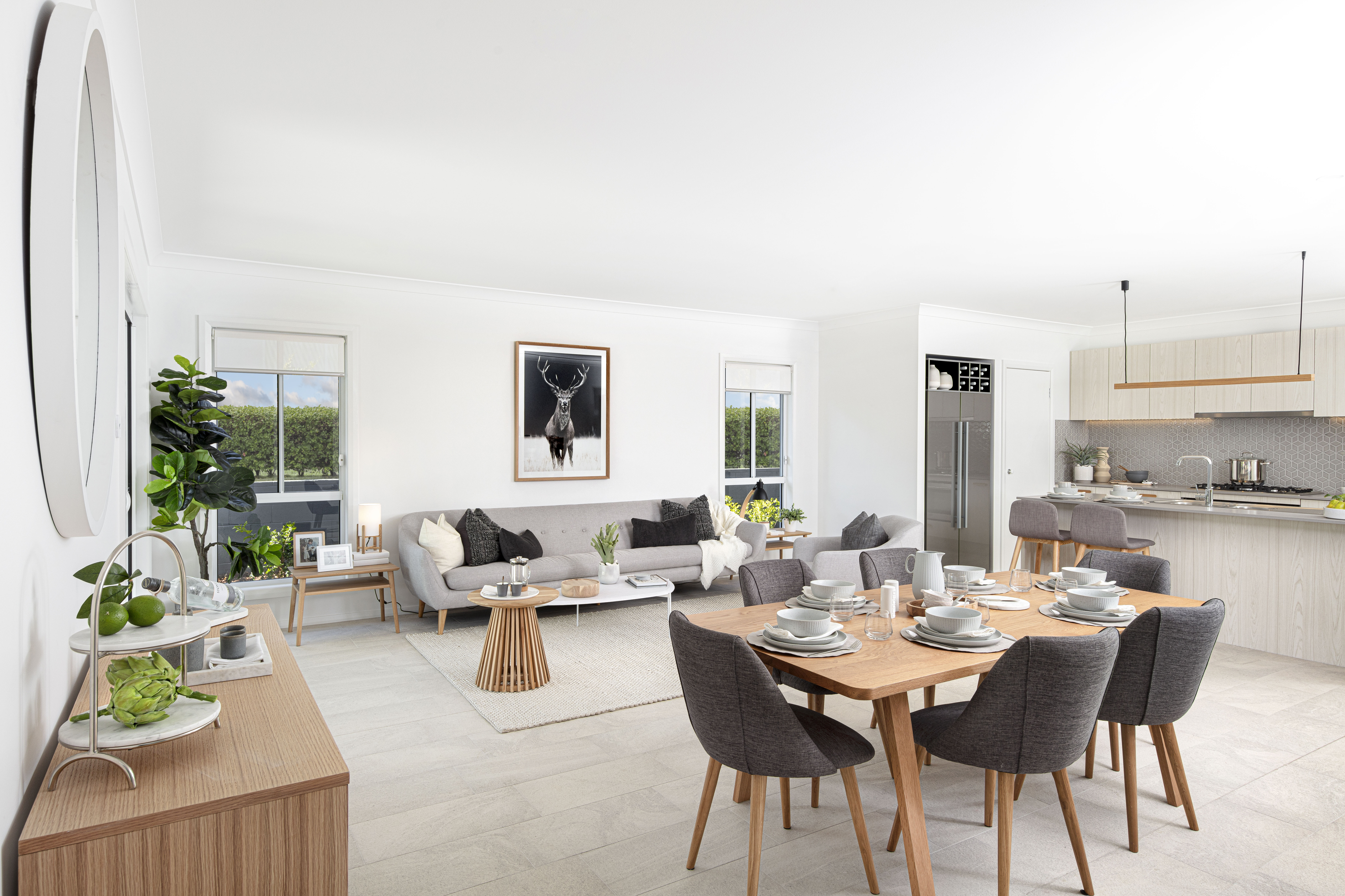 View from the corner of the dining area of the open plan dining, living and kitchen in the Lucia One display home