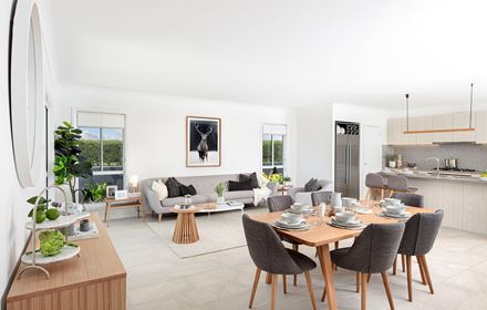 View from the corner of the dining area of the open plan dining, living and kitchen in the Lucia One display home